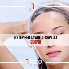 Scopri come lavarti i capelli come dal parrucchiere con questi 6 step. Una donna si lava i capelli sotto la doccia con schiuma.