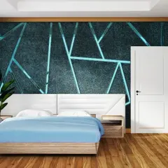 Camera da letto con un letto blu e una testiera bianca. Le pareti presentano una pittura geometrica con un motivo a forma geometrica e linee luminose.