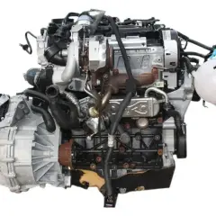 Silnik 1.6 TDI z turbosprężarką i skrzynią biegów, gotowy do montażu.