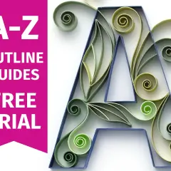Une lettre "A" décorée avec des spirales et des feuilles en papier quilling vert. Parfait pour une lettre à décorer.