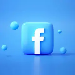 Błękitny, błyszczący kwadrat z białym "f" – tak wygląda faktura z Facebooka. Wokół unoszą się małe, niebieskie kuleczki.