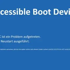Windows 11: Inaccessible Boot Device. Ein trauriges Smiley und die Meldung "Auf dem PC ist ein Problem aufgetreten." deuten auf einen Neustart hin.