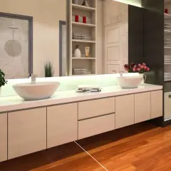 Nowoczesna łazienka z dwoma nablatowymi umywalkami. Szafka pod umywalkę nablatową ma niski profil, co podkreśla jej minimalistyczny design.