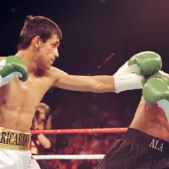 Boxer Ricardo "Finito" Lopez lands a punch in a light flyweight bout.