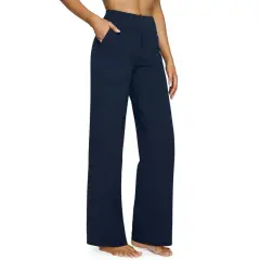 A person models navy blue yoga pants with a wide leg, perfect for hemming to achieve the ideal length for any activity.