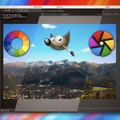 Darmowy program do obróbki zdjęć GIMP z kolorowym kołem i ikoną aparatu na tle górskiego krajobrazu.
