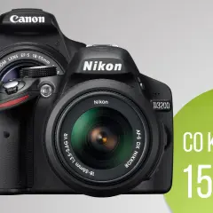 Dwa aparaty cyfrowe: Canon i Nikon, z obiektywami.