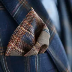 Poszetka męska - zastosowanie eleganckiego dodatku do garnituru.