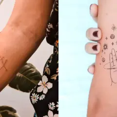 Delikatny tatuaż znak zodiaku Bliźniąt na przedramieniu. Obok tatuaż dłoni otoczonej gwiazdami i planetami.