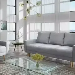 Jak zaaranżować salon z szarą kanapą? Inspiracje i porady