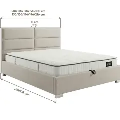 Łóżko z tapicerowanym zagłówkiem i materacem. Wymiary: wysokość 110 cm, szerokość 11 cm, wysokość materaca 30 cm, długość łóżka 215/218 cm.