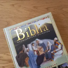 Okładka Biblii opowiedzianej dzieciom, z ilustracją sceny biblijnej i złotym napisem. Idealna do czytania opowieści biblijnych dla dzieci.
