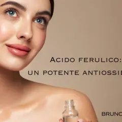 Donna con contagocce che applica un siero viso all'acido ferulico, un potente antiossidante per la pelle.