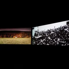 John Akomfrah art: a split screen showing a pastoral landscape with a small building and a dense crowd of people cheering.