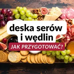Deska serów i wędlin: inspiracje na pyszne przekąski. Winogrona, figi, sery, wędliny i krakersy tworzą apetyczną kompozycję.