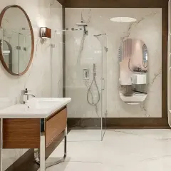 Elegancka łazienka z umywalką, prysznicem i bidetem. Bidet do czego służy? Do higieny intymnej, zapewniając świeżość.