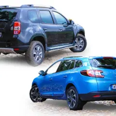 Dwa samochody z grupy Renault: czarny Dacia Duster 4x4 i niebieski Renault Megane kombi.