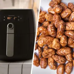 Schwarzer Airfryer neben einem Haufen glänzender, karamellisierter gebrannter Mandeln. Perfekt für süße Snacks!