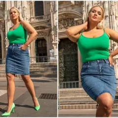 Kobieta w zielonym topie i jeansowej sukience szmizjerce plus size pozuje na tle zabytkowej budowli.