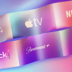 Logos of streaming services like Disney+, Apple TV, Netflix, Peacock, Paramount+, and HBO Max are displayed on colorful, wavy ribbons, showcasing the variety of what is online video.