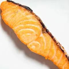 A perfectly cooked, flaky piece of salmon, ready for a delicious salted salmon recipe.
