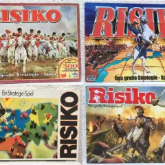 Vier verschiedene Risiko Brettspiel Versionen mit historischen Motiven.