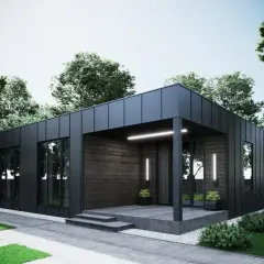 Nowoczesny dom modułowy 100m2 cena pod klucz, z czarną elewacją i drewnianymi akcentami, otoczony zielenią.
