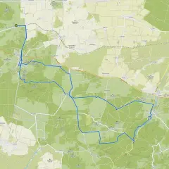 Mapa z zaznaczonymi trasami rowerowymi wokół Olsztyna. Trasa prowadzi przez lasy i tereny pagórkowate.