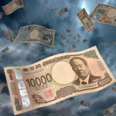 Pieniądze, banknoty 10000 jenów i inne, spadają z nieba. Kurs jen japoński w burzliwych czasach.