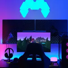 A gamer's setup with RGB lighting, where RGB stands for Red, Green, and Blue, creating a vibrant atmosphere.