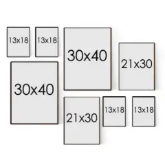 En samling ramar i olika storlekar: två 13x18, två 30x40, två 21x30 och två 13x18. Avstånd mellan tavlor är viktigt för en fin tavelvägg.
