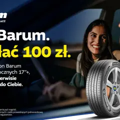 Szczęśliwa para w samochodzie cieszy się z promocji na opony Barum. Kupując komplet, otrzymasz 100 zł zwrotu.