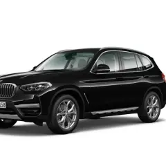 Elegancki, czarny x3 bmw z chromowanymi detalami i felgami stoi na białym tle.