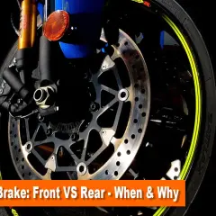 Primer plano de la rueda delantera de una motocicleta deportiva azul, mostrando el disco y la pinza de freno. ¿Cuál es el freno?
