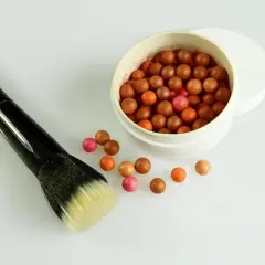 Perełki brązujące Avon: Jaki odcień wybrać? Przewodnik eksperta!