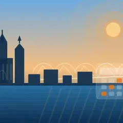 Silhouetten einer Stadt am Wasser, mit einem Kalender, der den Reformationstag als Feiertag in NRW markiert.