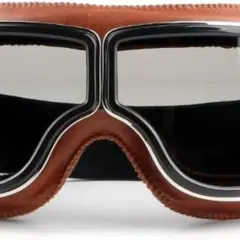 Occhiali biker in pelle marrone con lenti scure, perfetti per un look retrò e avventuroso.