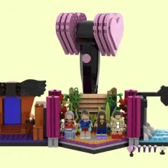 BLACKPINK LEGO-Set mit den vier Mitgliedern, einem Thron, einer Bühne und dem ikonischen Hammer-Licht.