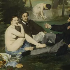 A nude woman and two clothed men on grass, a scene that caused a luncheon on the grass controversy. A second woman bathes in the background.