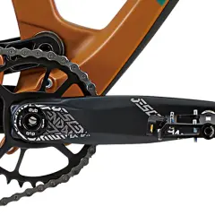 Close-up of a bike's crankset and chainring, showing the DUB bottom bracket and pedal.
