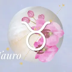 Símbolo de Tauro rodeado de flores rosas y un orbe lunar. El texto "Tauro" aparece en la parte inferior izquierda.