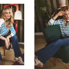 Kobieta w pasiastym swetrze i jeansach pokazuje, do czego nosić sneakersy. Stylowa, wygodna stylizacja na co dzień.
