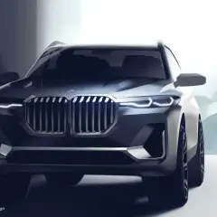 Stylizowany szkic BMW X8 z charakterystyczną atrapą chłodnicy i ostrymi światłami.