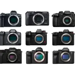 Dziewięć czarnych aparatów bezlusterkowych różnych marek: Canon, Panasonic Lumix, Fujifilm i Sony.