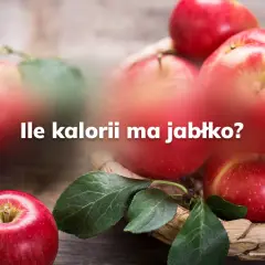 Czerwone jabłka w koszyku, a na nich pytanie: ile kalorii ma jabłko? Zdrowe przekąski.