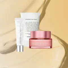 Zwei Hautpflegeprodukte: eine Tube Biotherm Aquasource Hydra Barrier Cream und ein Tiegel Clarins Multi-Active Jour. Beide sind reichhaltige feuchtigkeitscremes für strahlende Haut.