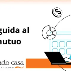 La guida al mutuo: una donna con occhiali lavora al laptop, circondata da grafici, calcolatrice e monete, per preparare i documenti per mutuo.