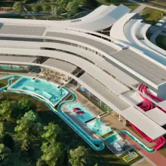 Nowoczesny aquapark Rzeszów z basenami, zjeżdżalniami i strefą relaksu, otoczony zielenią.