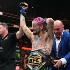 Sean O'Malley wins by split decision vs. Petr Yan, UFC President Dana White presents the belt.