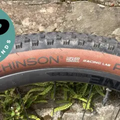 Close-up of a Hutchinson Python tire on a bike wheel, with a "BP Recommends" logo.